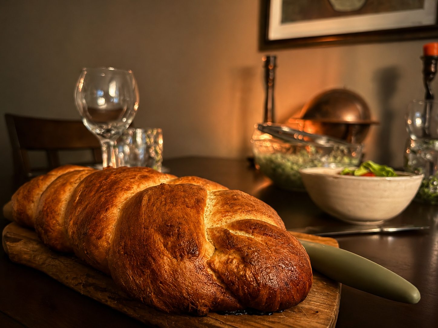Braided loaf on a set table — Studio Blasetti photography